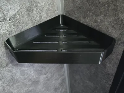 Corner shelf for the shower
