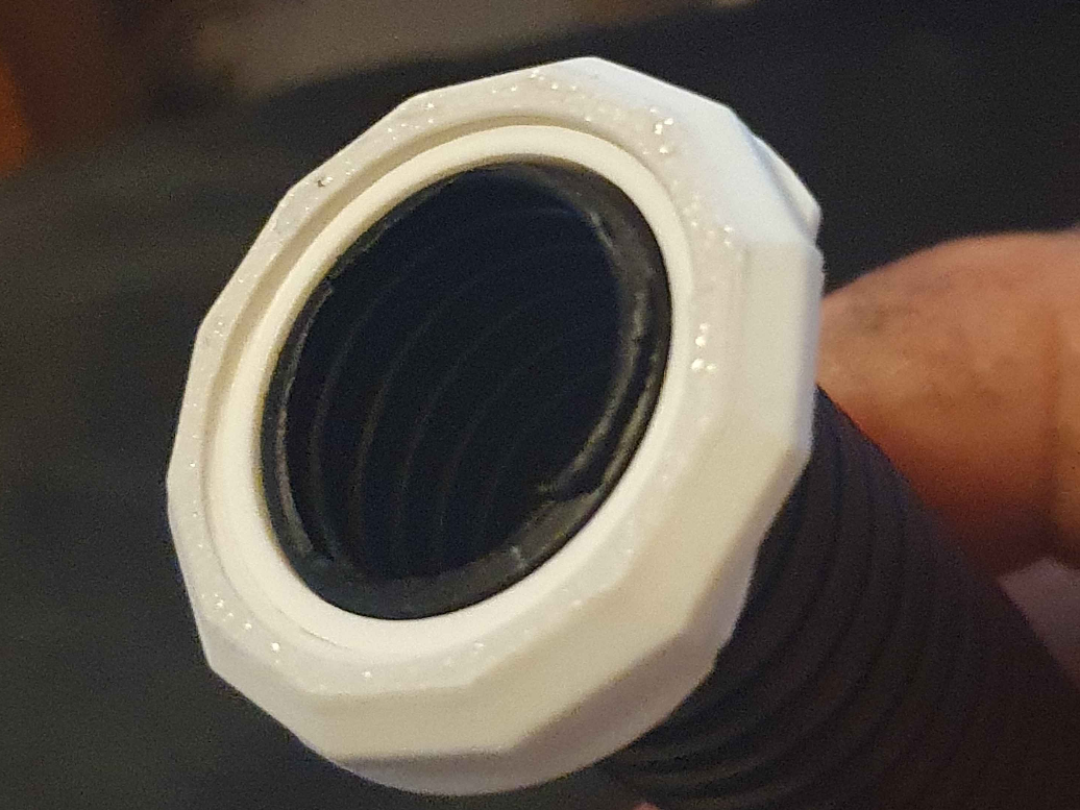25mm hole to 20mm flexible conduit adapter.