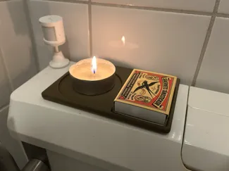 Candlelight holder for toilet
