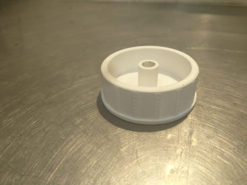 Workshop paper/centerfeed axle cap/bearing