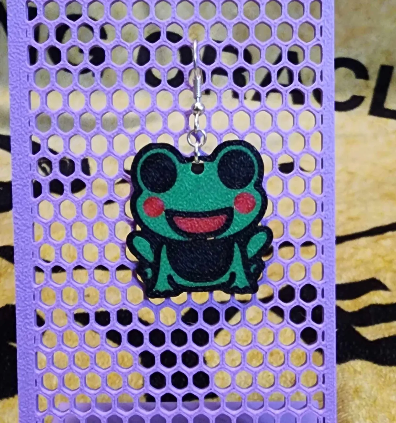 Cartoon frog earrings view 2
