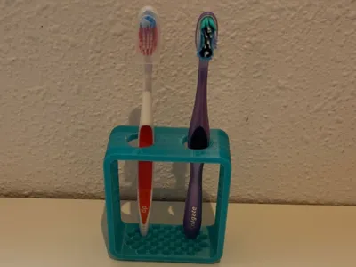 Tooth brush holder with initials