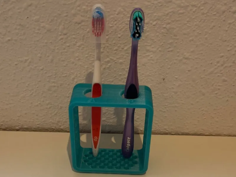 Tooth brush holder with initials