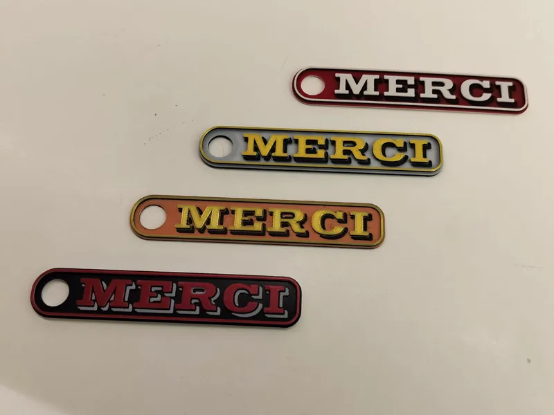 Merci Keychain