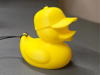Cute duck wearing a baseball cap keychain