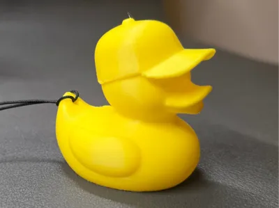 Cute duck wearing a baseball cap keychain 