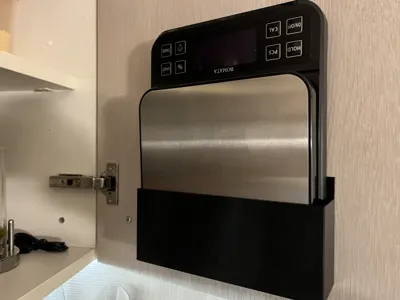 Door-mounted scale holder