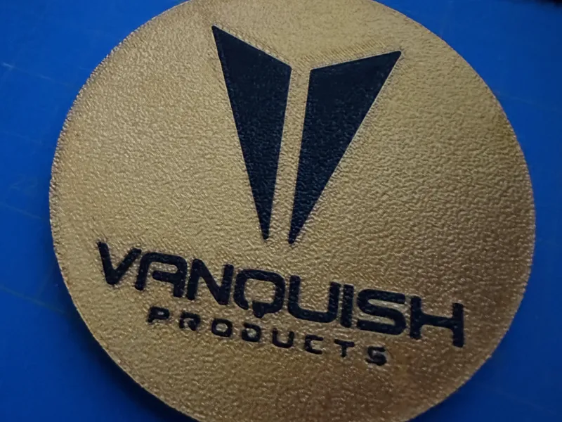 Vanquish coins / coasters - Logo and Comp Stance