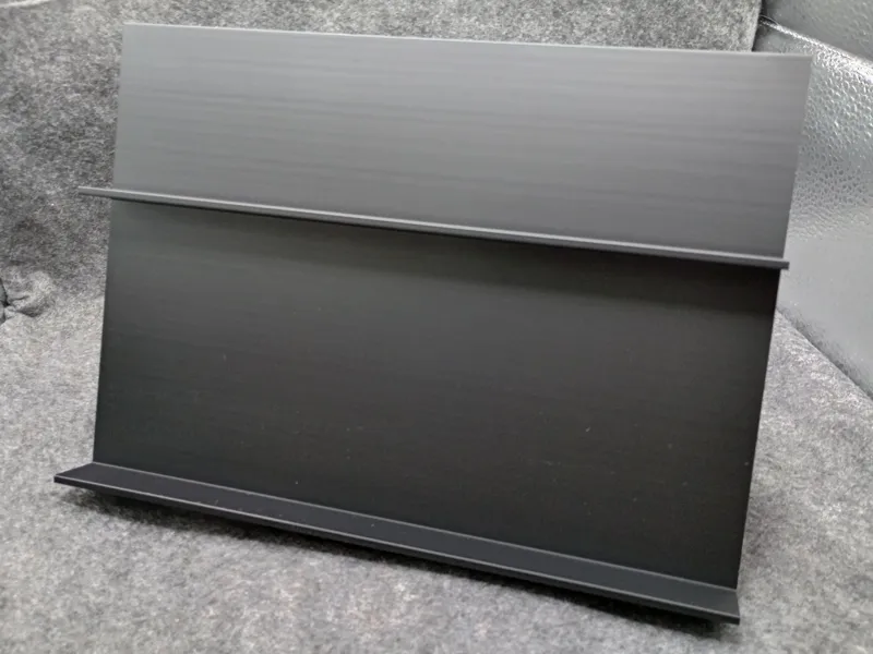 Angled display rack for table or desk