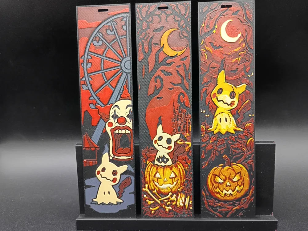 Accesorio de lectura: Mimikyu Halloween Bookmark Set. Referencia del modelo original.