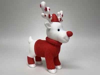 Christmas reindeer with knitted sweater