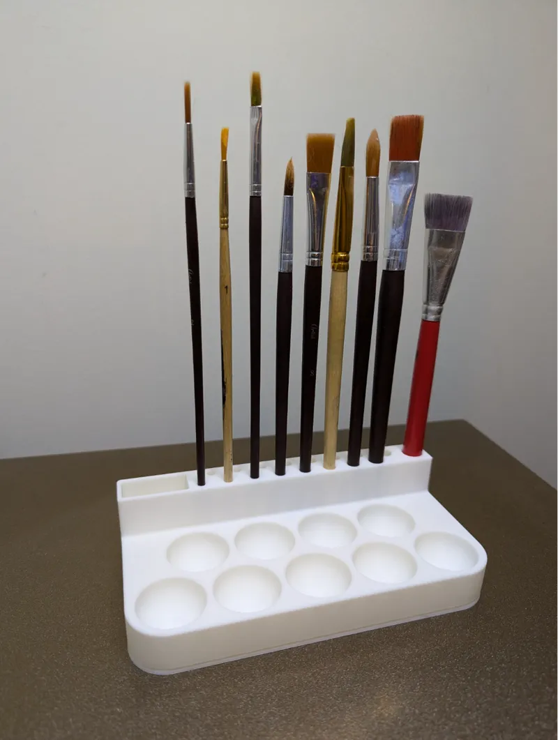 Paint palette with paintbrush organizer