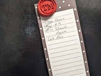 Taskmaster logo magnet