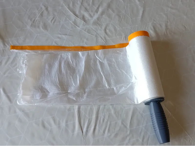Handle for unwinding paint protection film rolls