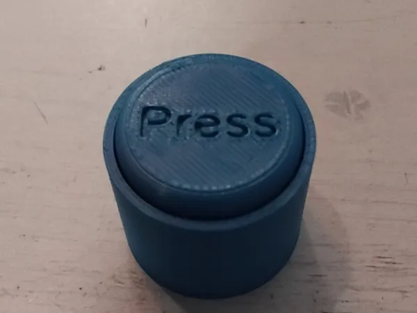 Bouton fidget anti-stress