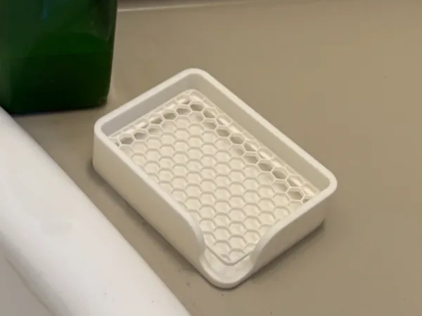 Porte-savon avec grille égouttoir amovible