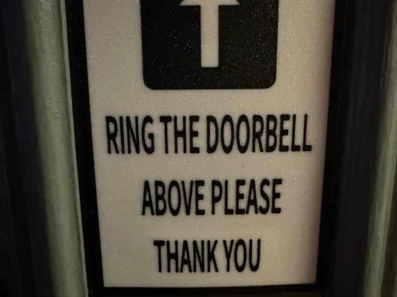 PLEASE RING THE DOORBELL ABOVE SIGN 