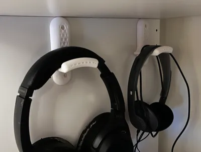 Headphones wall holder with honeycomb pattern