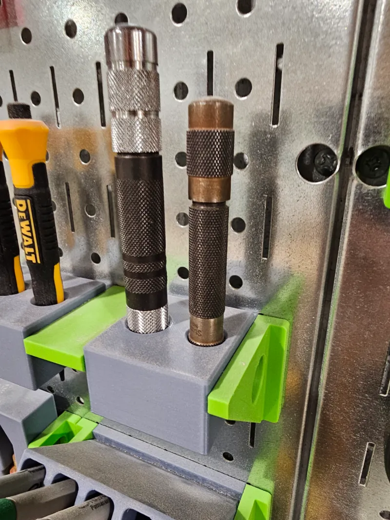automatic punch holder for wall control