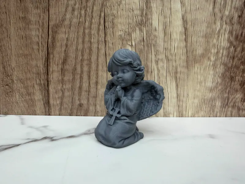 angel with a cross praying
