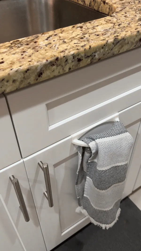 Towel holder with spray bottle storage view 3