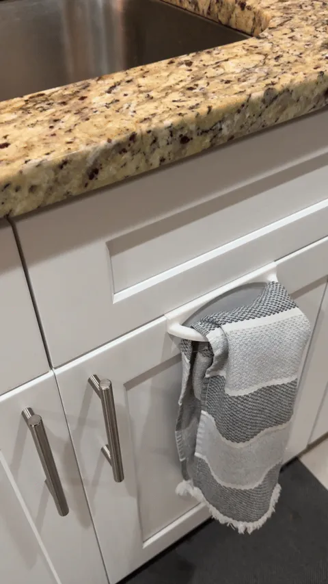 Towel holder with spray bottle storage view 3