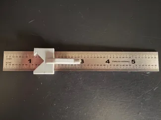 Metal rule / ruler pocket clip, stop, and square