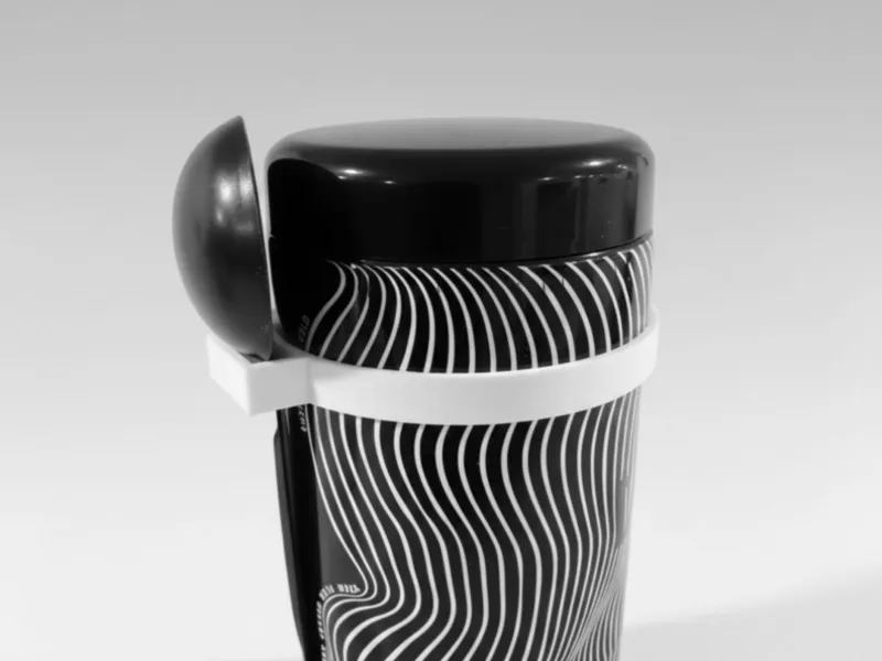 Coffee container spoon holder