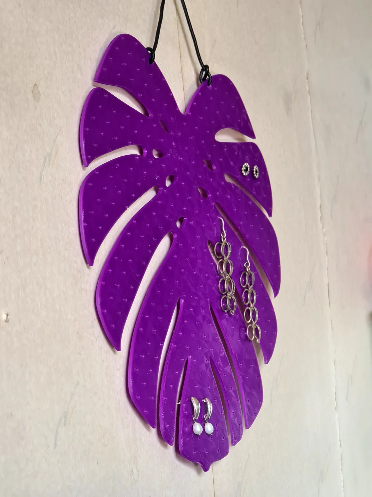 monstera leaf earring display rack view 2