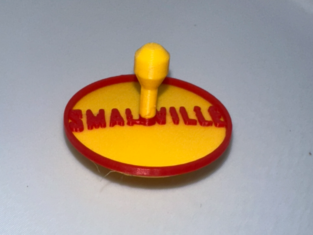 Smallville Spinning Top