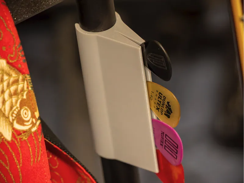 Guitar pick holder for guitar stands