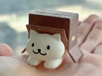 kawaii cat under the box. cute kitten