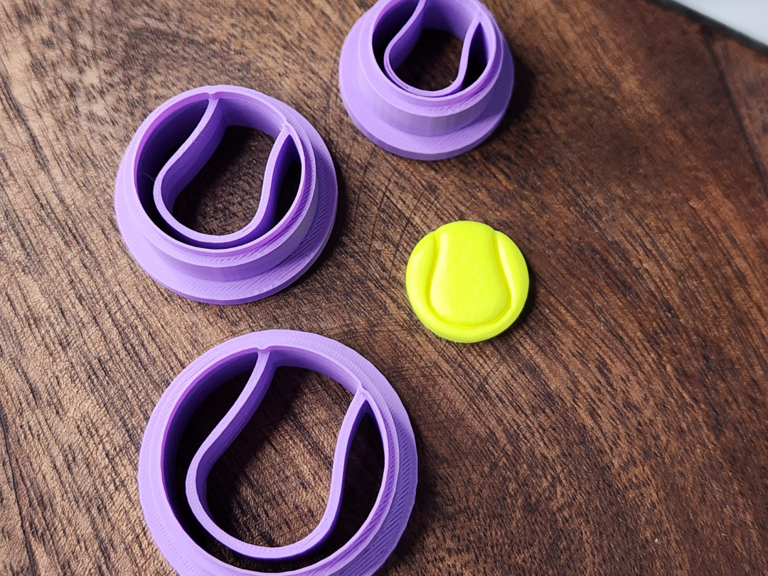 Tennis bal earring cutter