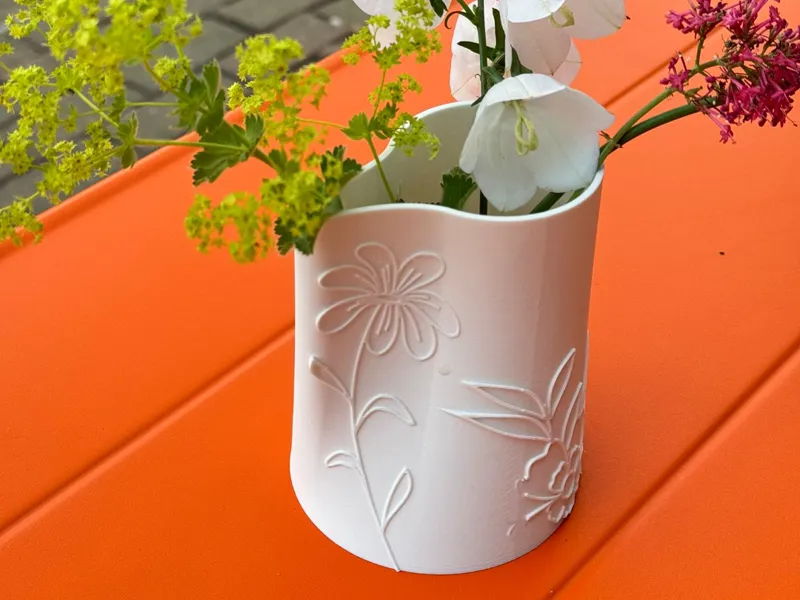 Cute vase / watering can with flower decorations