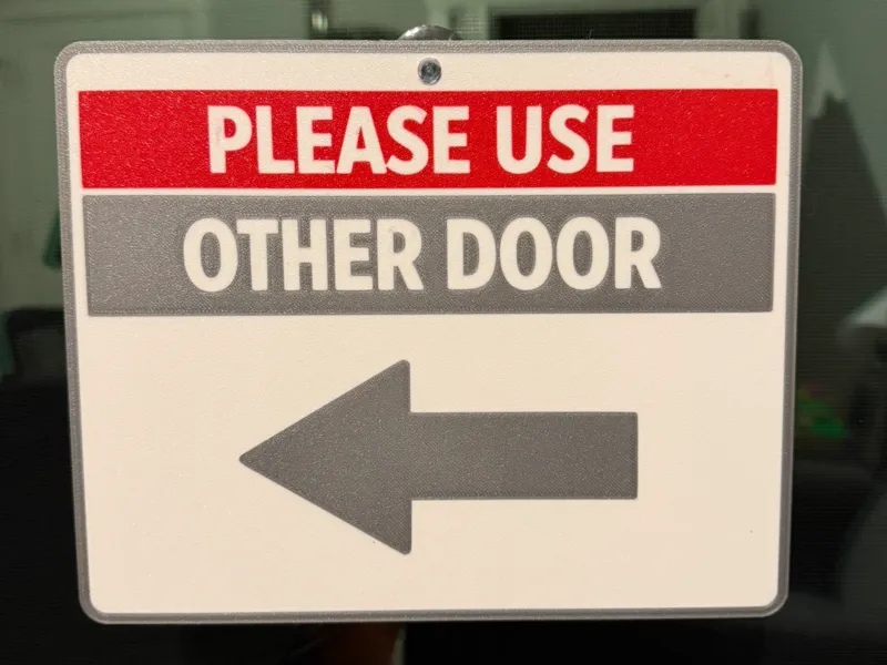 Please Use Other Door Sign with Arrow Each Way