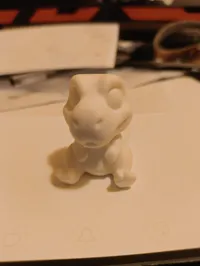 T-Rex chibi assis — photo 2