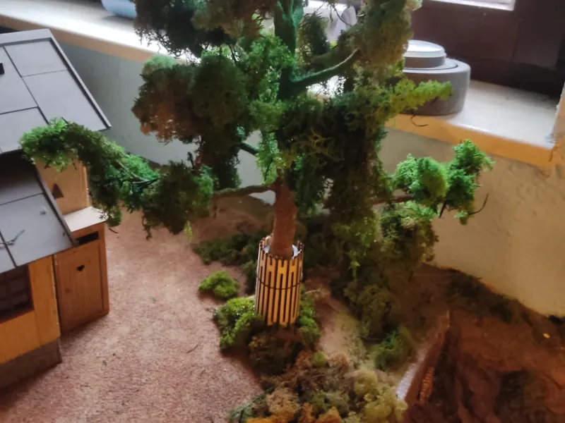 Tree stand for a model train scene