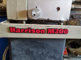 Harrison M300 badge