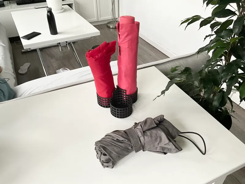 Umbrella holder for folding umbrellas.