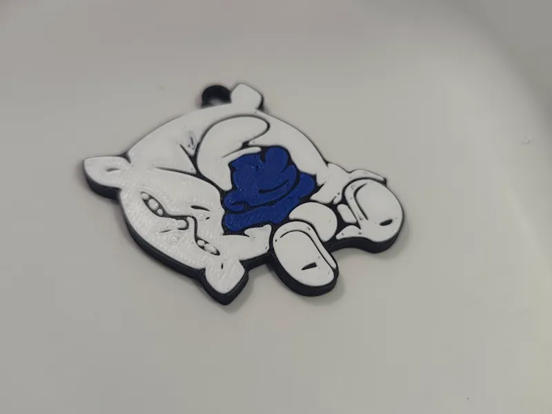 Sleepy Smurf keychain