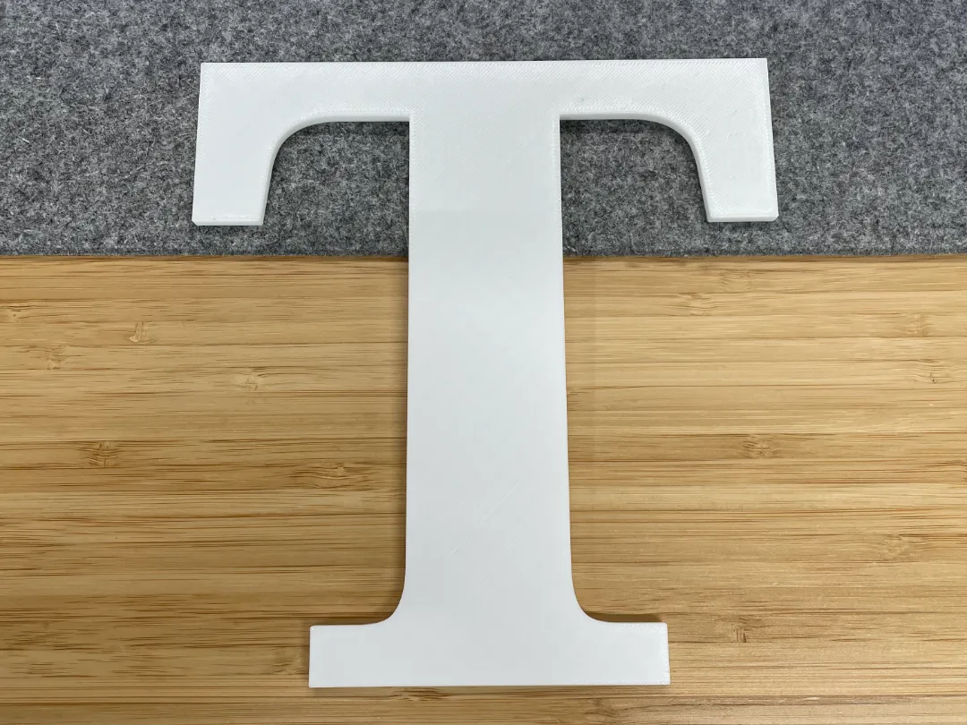 Lettre décorative T