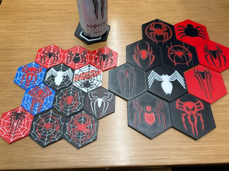 35 different spiderman logos Coasters & ornaments
