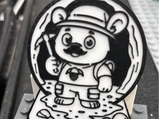 Amoquanuat Badge
