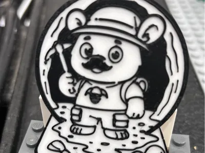 Amoquanuat Badge