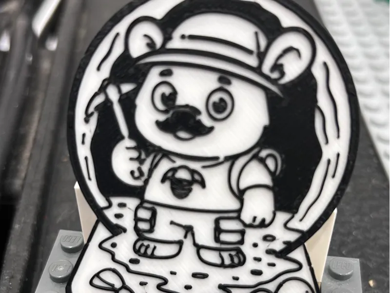 Amoquanuat Badge