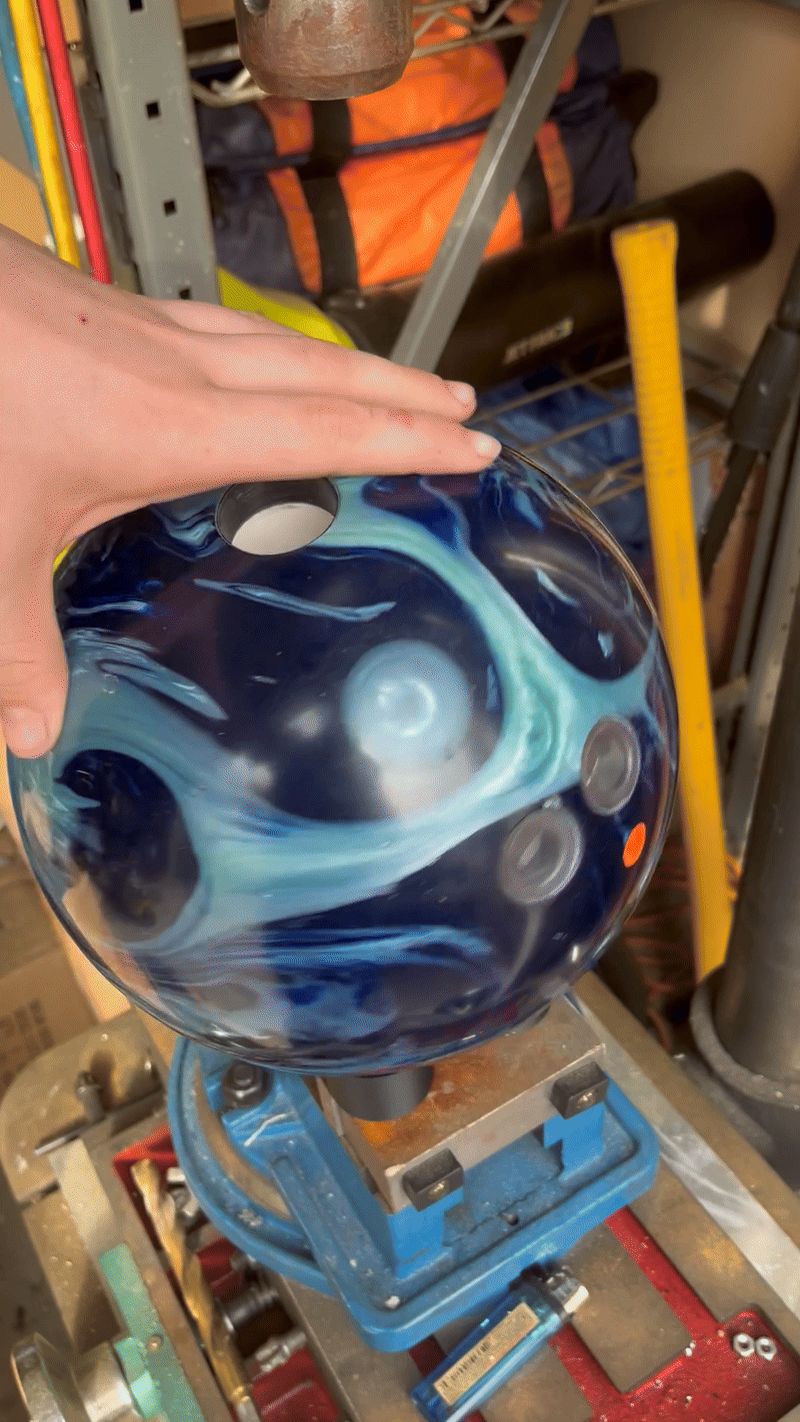 Rolling custom bowling ball stand for drill press