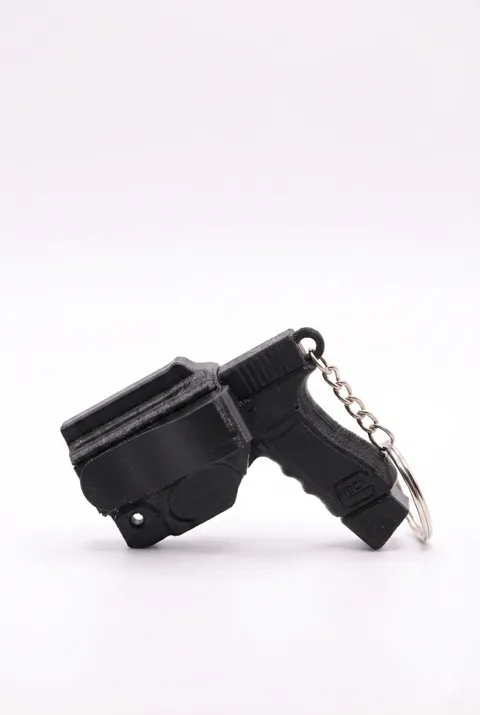 The QuickDraw Keychain - Mini Pistol & Holster view 4