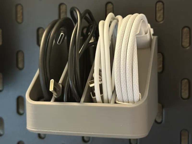Cable storage for IKEA Skadis Pegboard