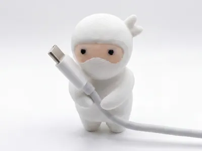 Cable Holder Ninja Figure – Your Desk's Guardian!