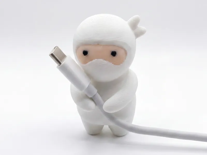 Cable Holder Ninja Figure – Your Desk's Guardian!